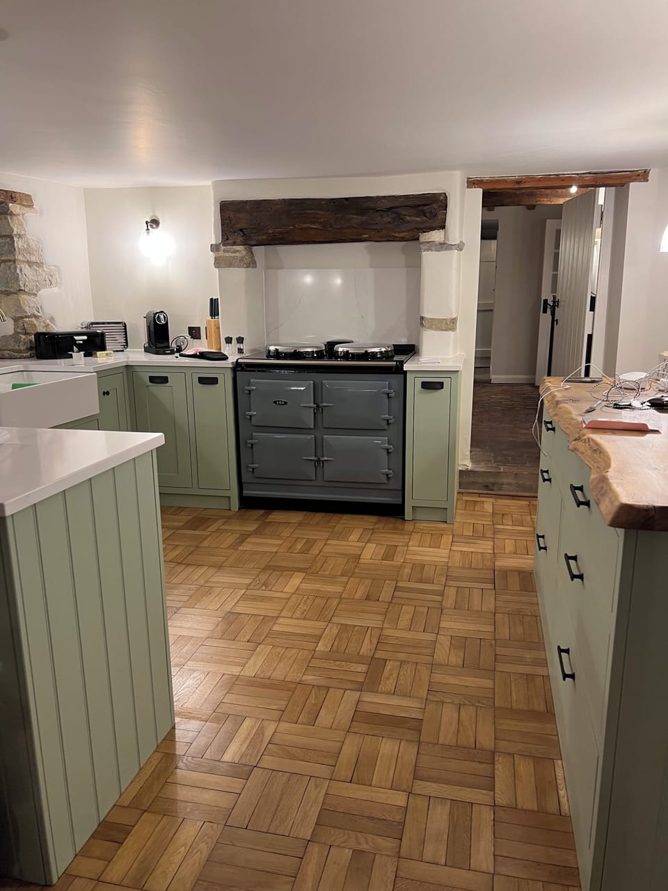 large unit to the right full of pots, pans and serving dishes for any occasion.