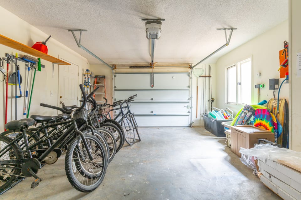 6 Bikes, beach towels, chairs and gear.  Please store all items in garage.
