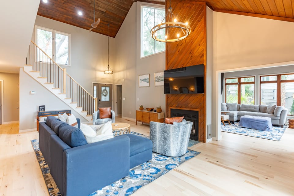 Living room with views of sunroom