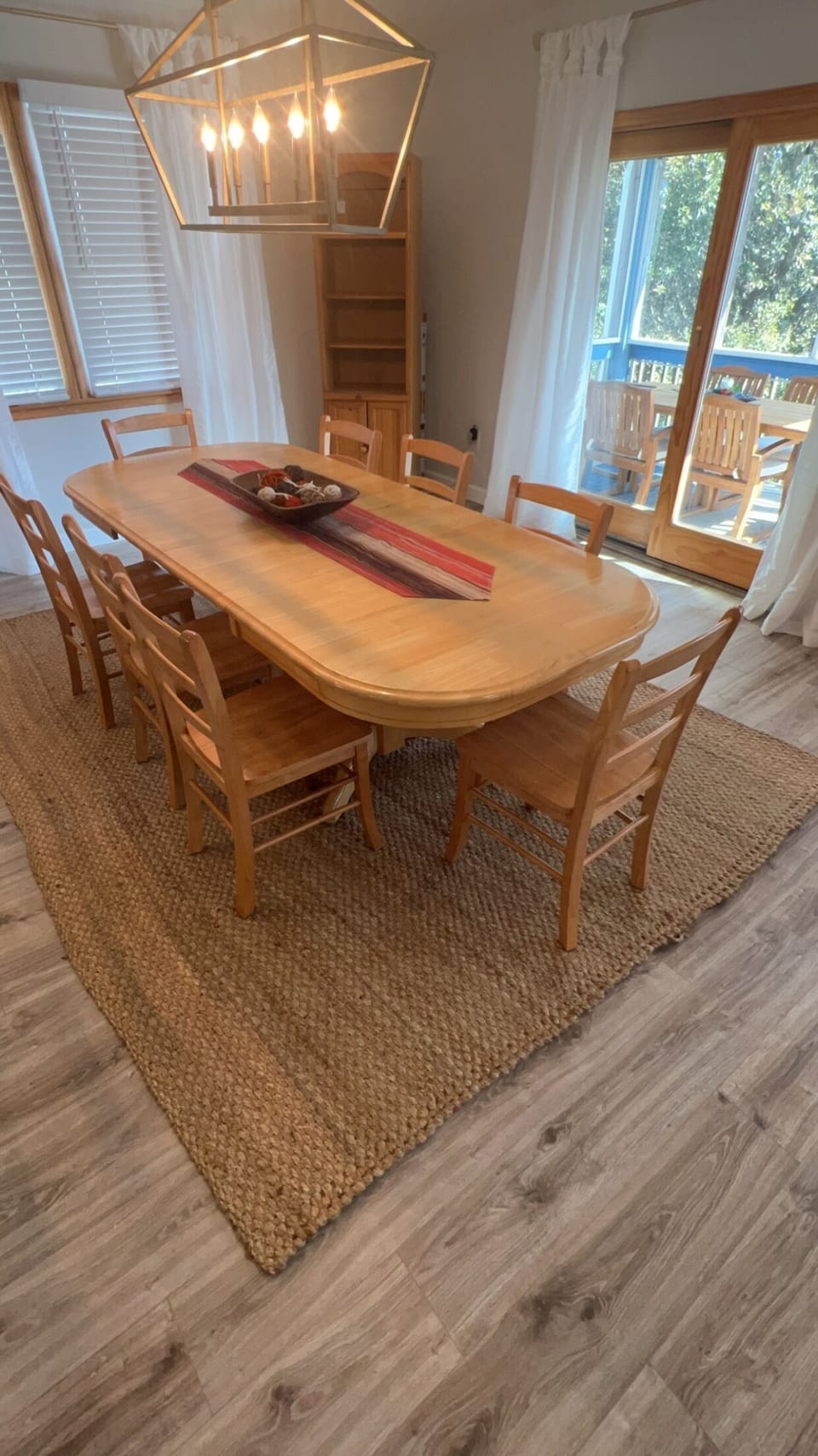 The large family style dining table offers opportunity for meals together. 