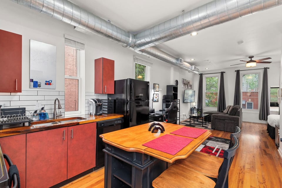 Fully stocked kitchen connected to the main studio space