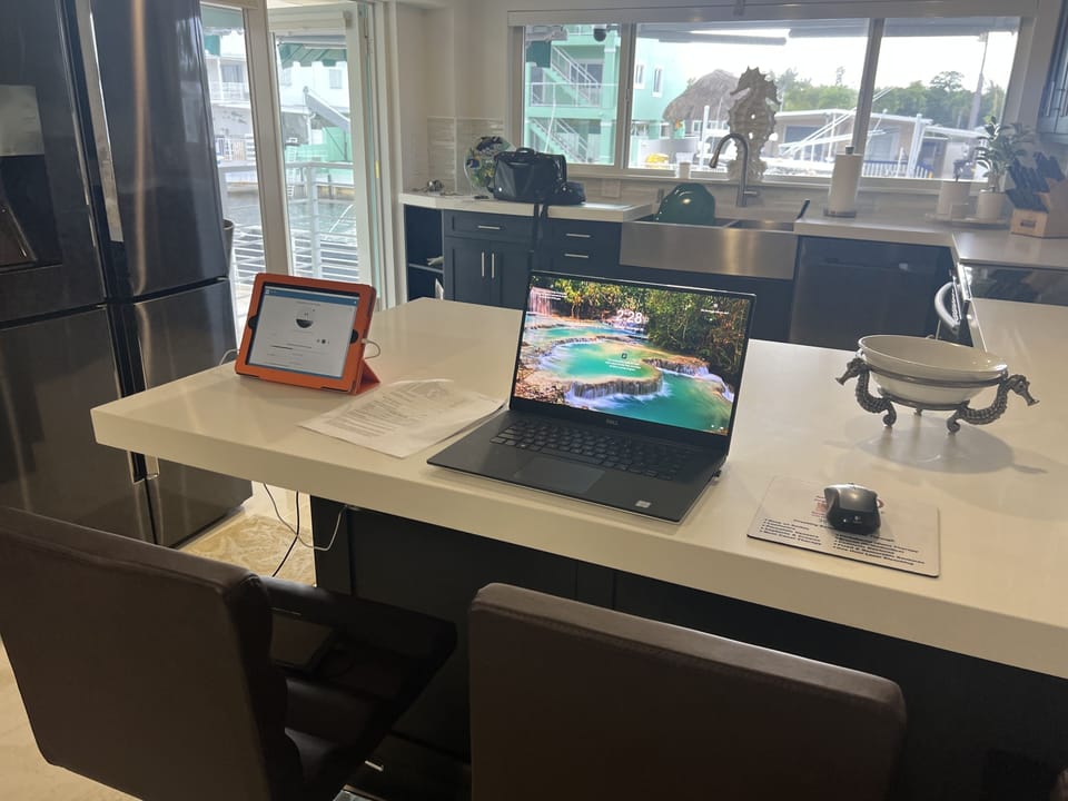 A 3 stool kitchen counter to seat back and enjoy your meals with a view