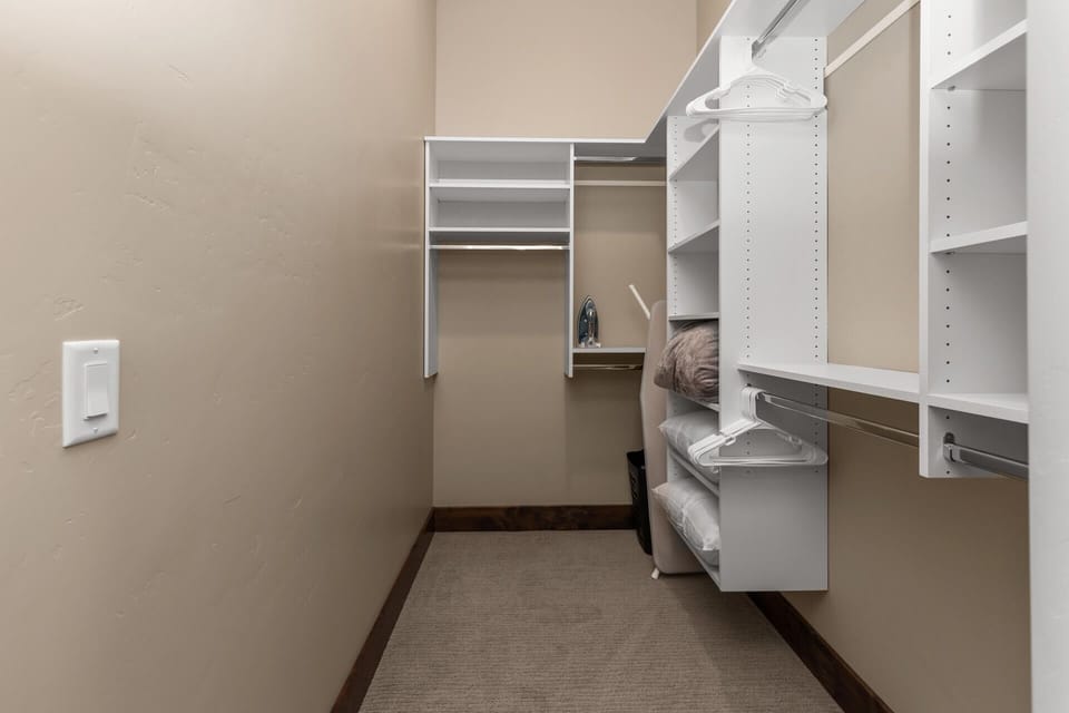 Organized shelves and boxes neatly arranged in the spacious storage area.
