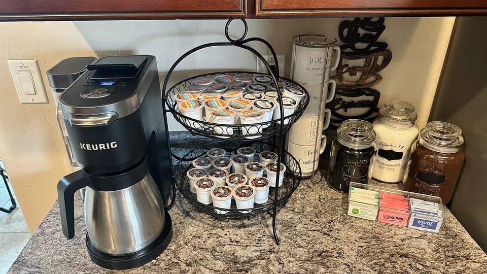 Kitchen fully stocked with coffee and tea.