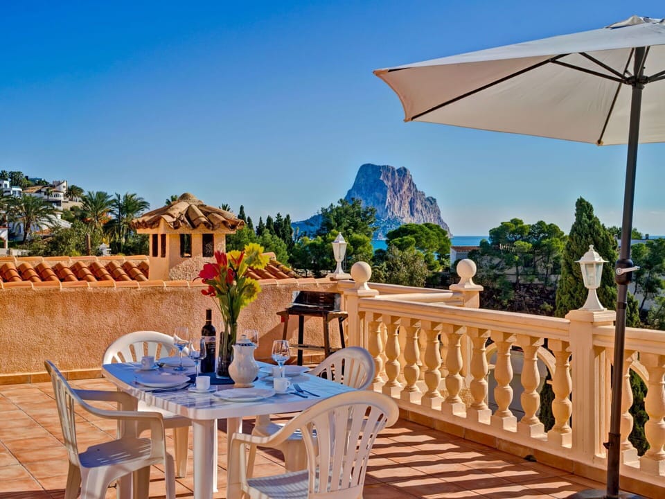 Sky, Table, Furniture, Property, Outdoor Table, Nature, Azure, Chair, Outdoor Furniture, Building