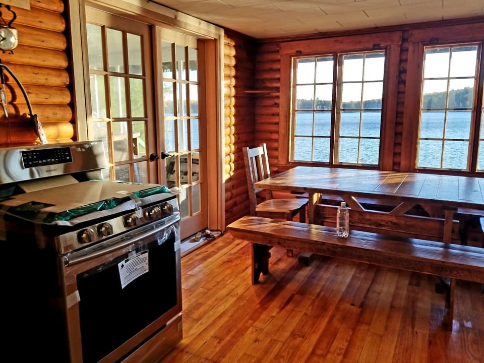 Kitchen with the Amish Barn Wood Farm-style Table seating 8-10 people