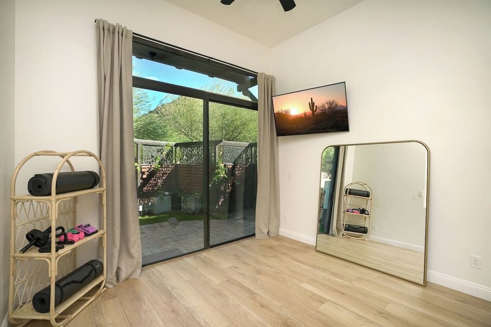 Yoga room located directly off of the owner's suite bathroom, leading outside to a healing garden perfect for morning meditation to start your day.