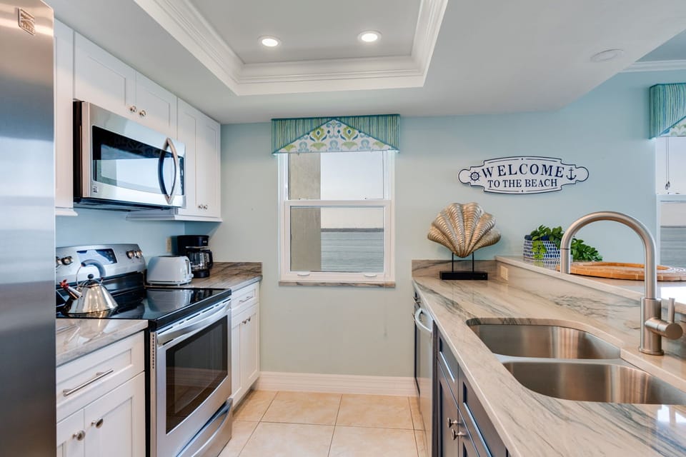 Fully stocked kitchen with modern appliances