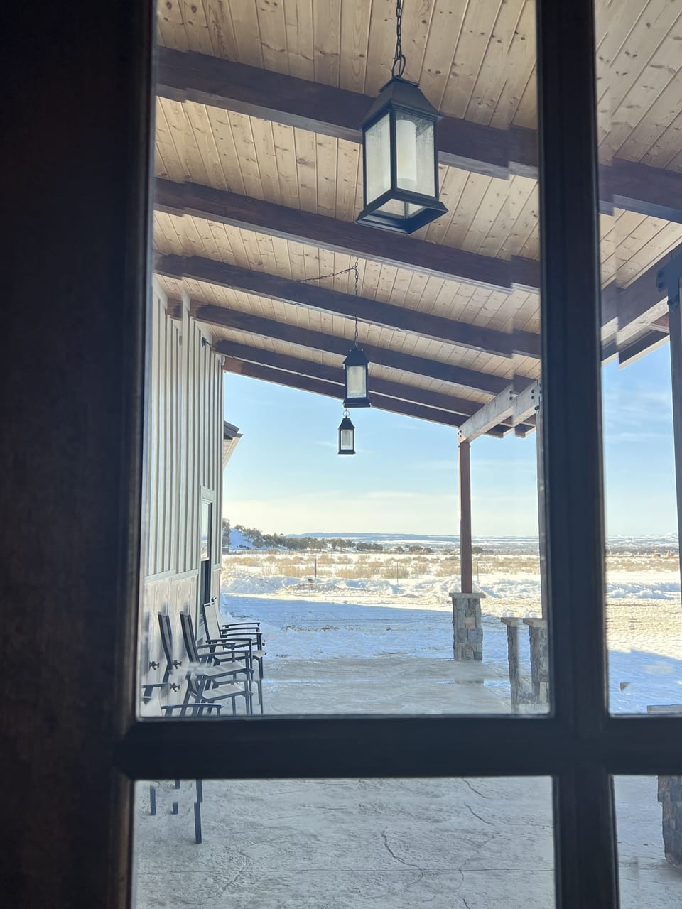 View of the front porch from the bedroom suite.