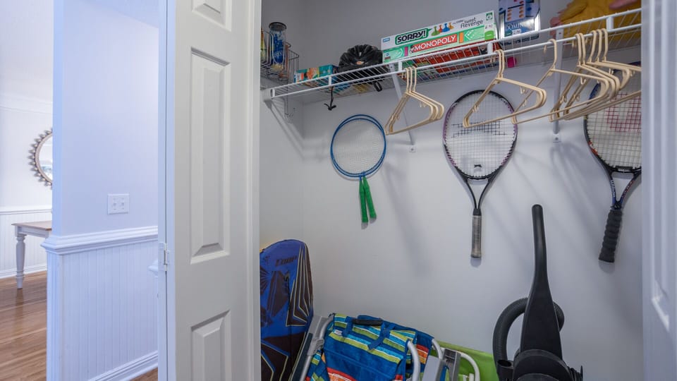 Tennis rackets, games, and beach chairs