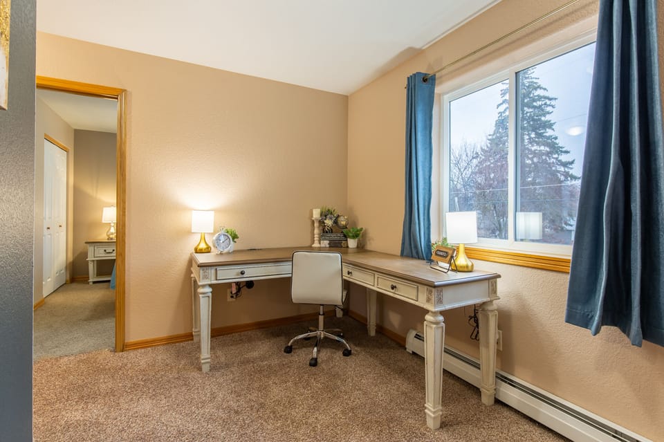 Loft area with a large work station 