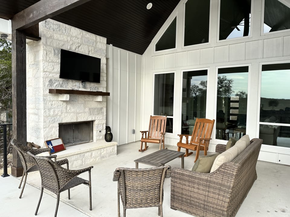 Covered porch with plenty of seating to watch the beautiful sunsets!