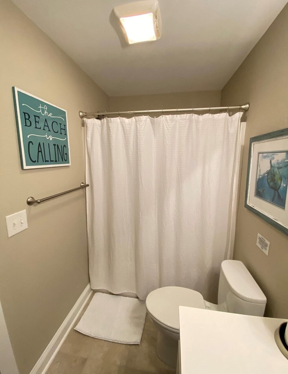Full bathroom with shower and tub