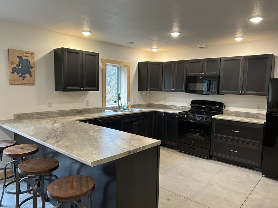 Open floor plan from kitchen to living room.