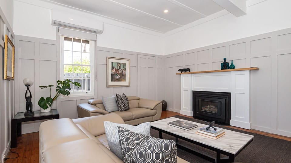 Downstairs living area with fire place