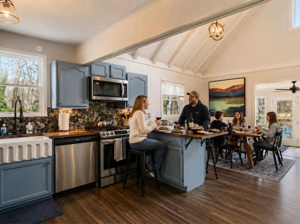 The kitchen is a true standout, featuring beautiful wood countertops, sleek stainless-steel appliances, and a unique river rock backsplash. It’s the perfect space to cook, entertain, or simply enjoy the stunning details.