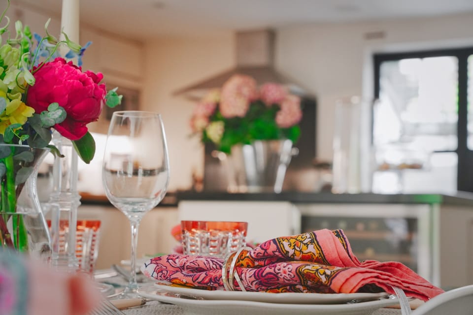 Crockery plates and linens are all on hand for at home dining