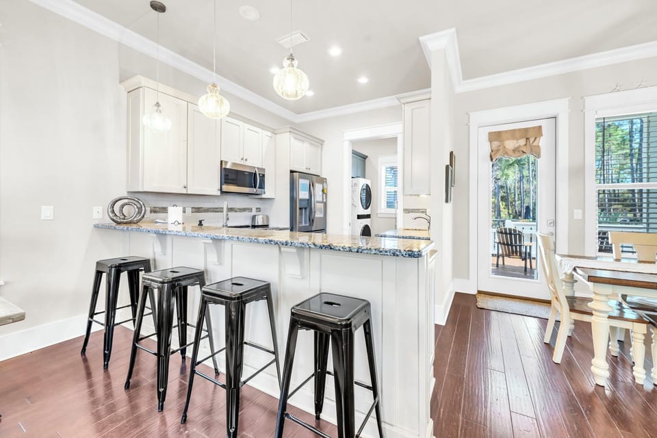 Kitchen bar with seating.
