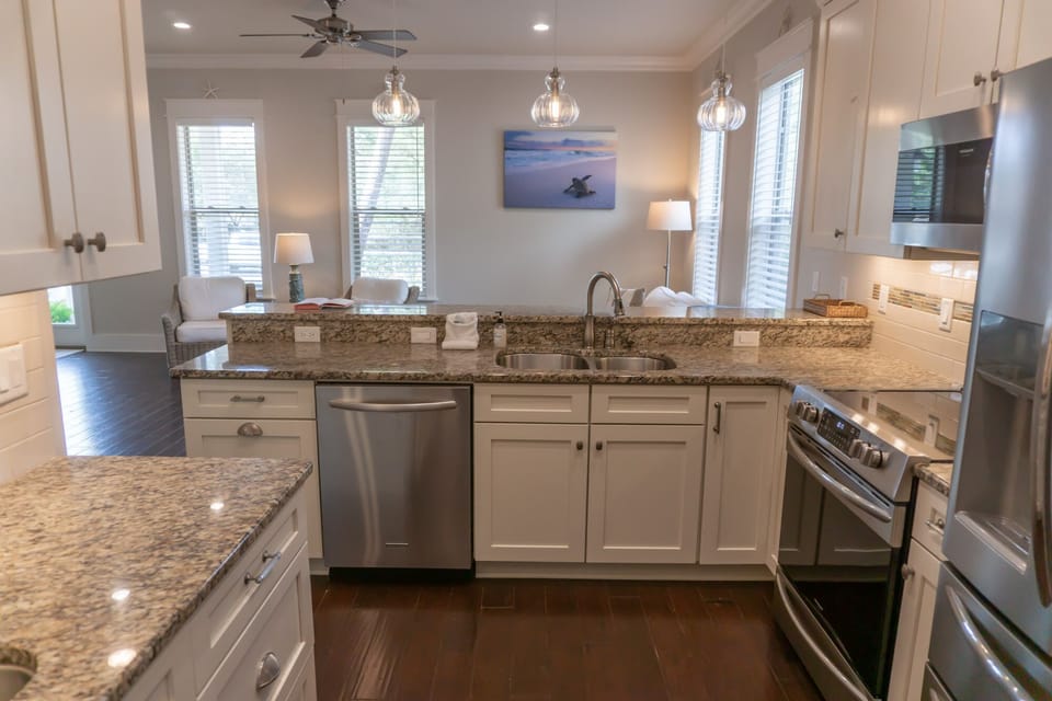 View into living room from the kitchen.  This kitchen also has a wet bar.