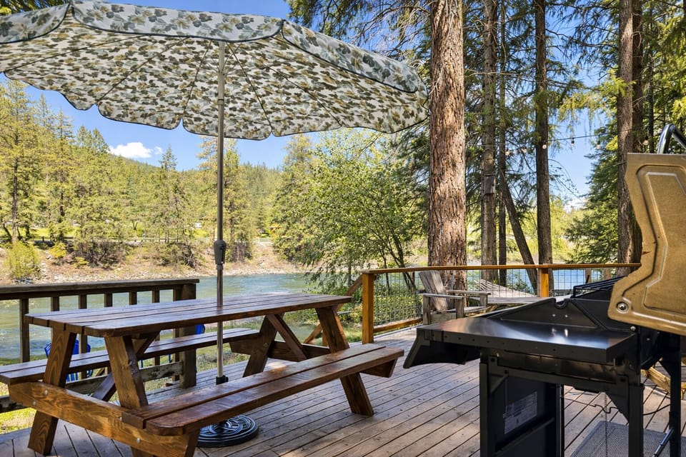 Uncovered deck with year round private hot tub, propane grill and propane fire pit.