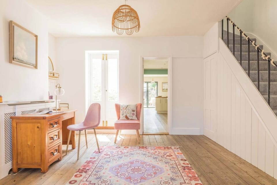 Writing desk in through room from living room to kitchen