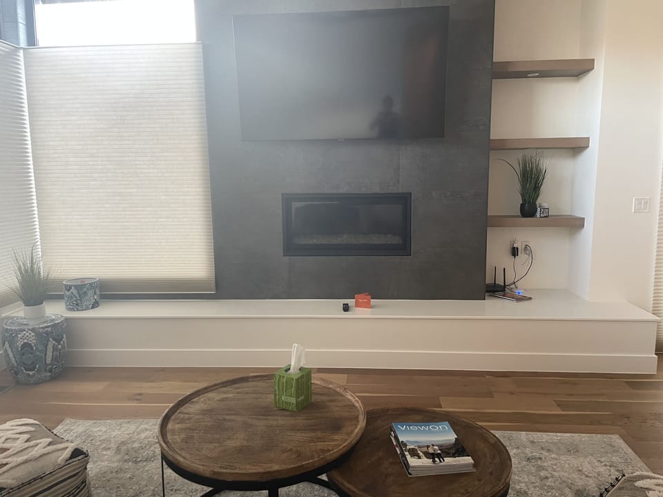 Living Room Smart TV and Gas Fireplace