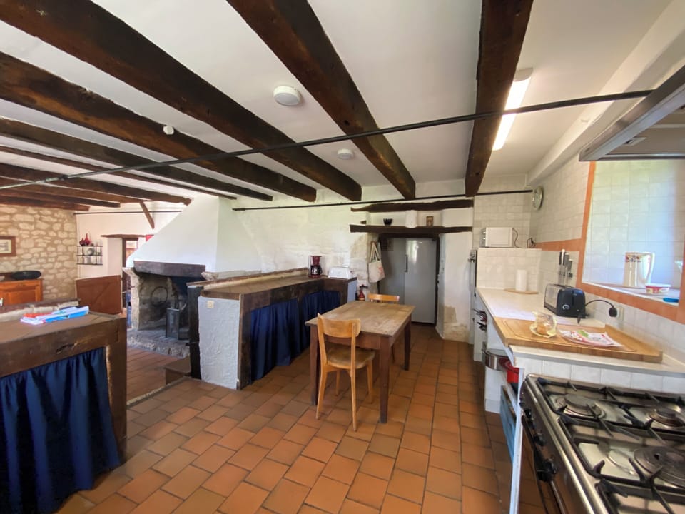 The kitchen is well equipped with a large pantry with a large freezer & fridge