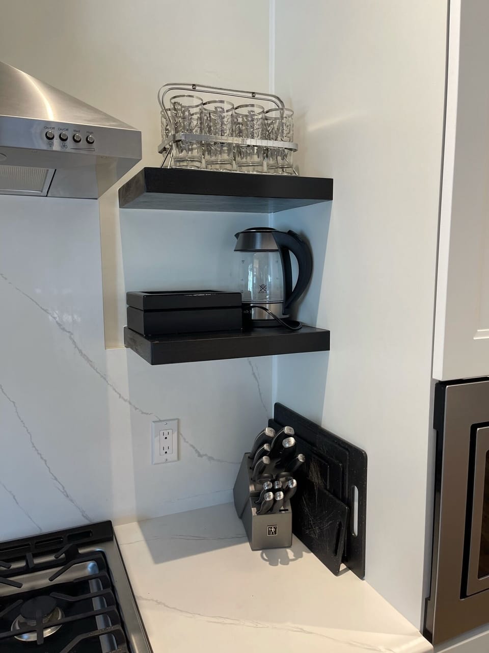 Electric Tea kettle and black tea provided.