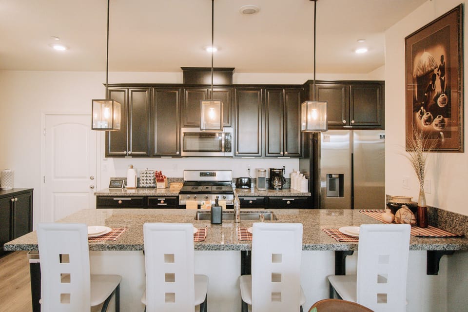 Large eat in island with granite countertops