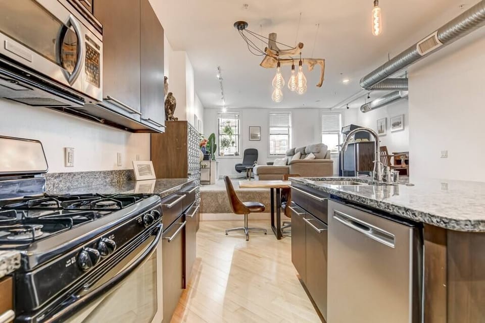Living Room / Dining Room / Fully stocked kitchen