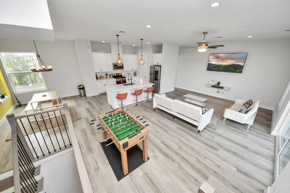 Open Concept living room, perfect for entertaining.  Features Foosball table