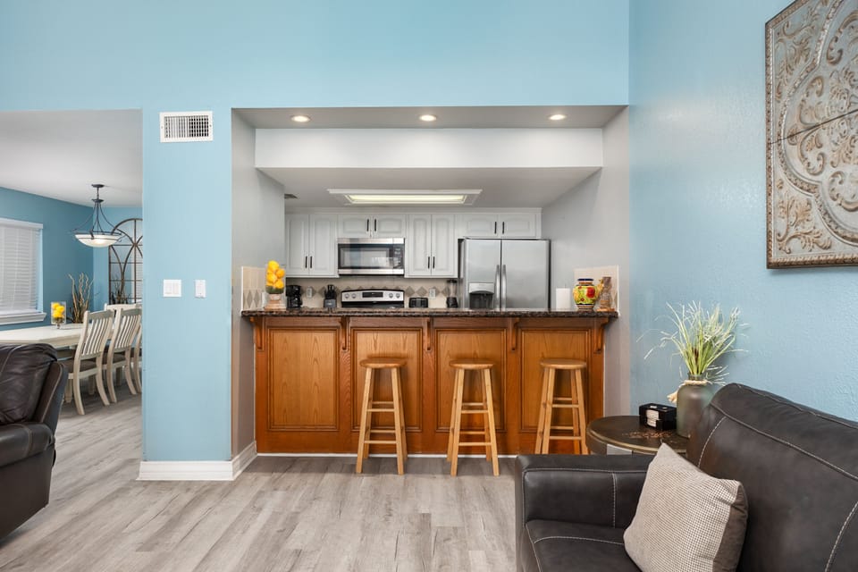Open concept style townhome with extra bar seating in the kitchen area for 3 guests