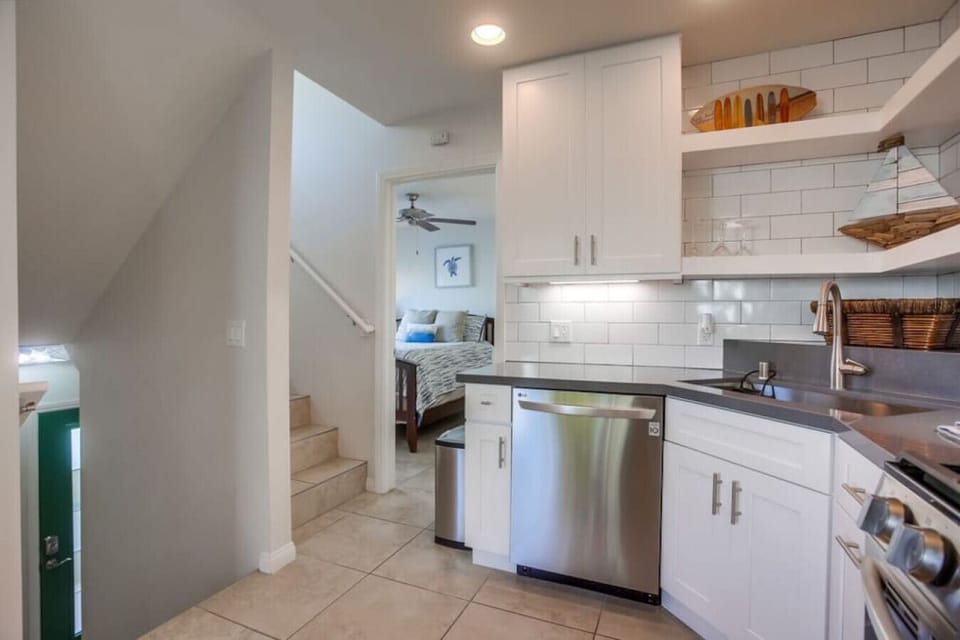 819 second floor bedroom is off the kitchen