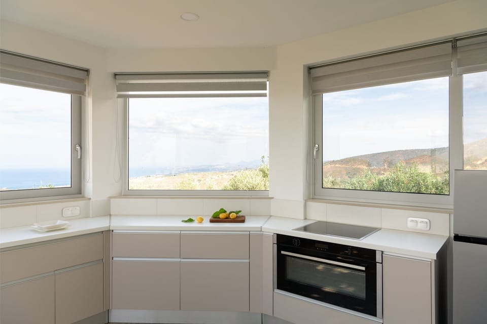 Fully equipped outdoor kitchen next to the outdoor dining area.