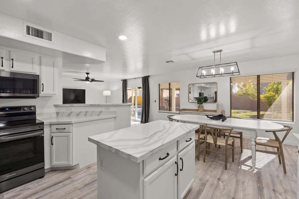 Very light and airy, open kitchen and island.