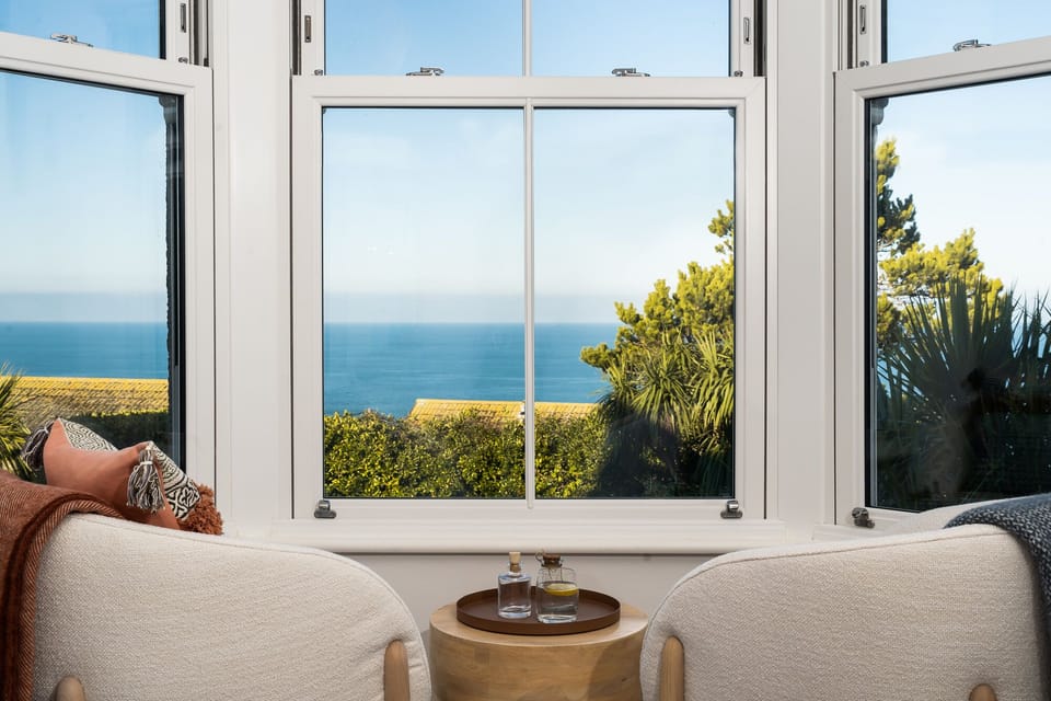 King bedroom with stunning sea and beach views