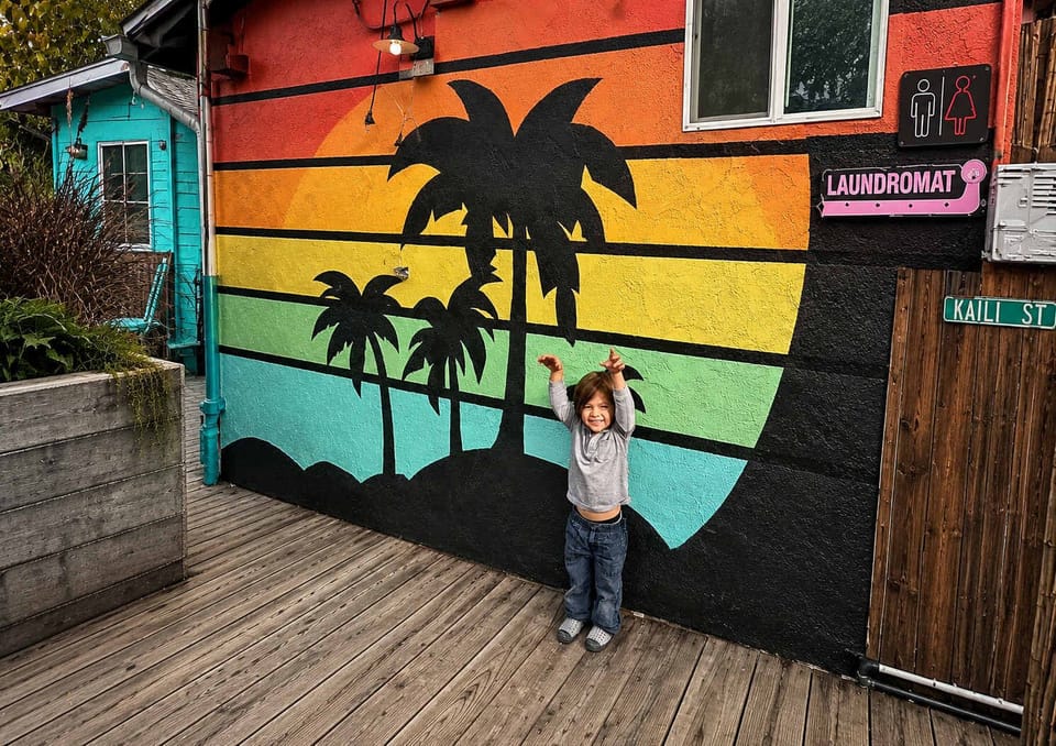 Colorful Tropical Sunset Mural at Good Life Resorts – Vibrant Palm Tree Artwork, Beach-Inspired Walkway & Fun Photo Spot Perfect for Good Life Vacation, Beach Party San Diego, Private Spaces & Goodlife Eventsو Party Event Space & Venue Rentals