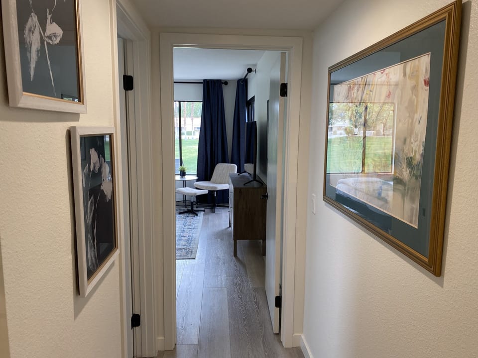 Hall to bathroom and primary bedroom