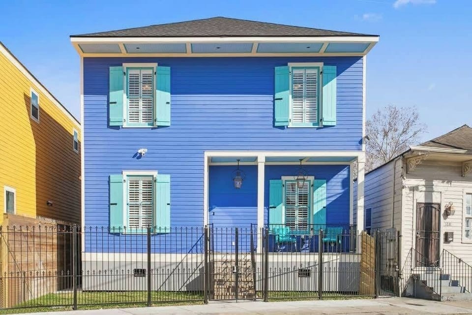 Front exterior of the home with gated yard