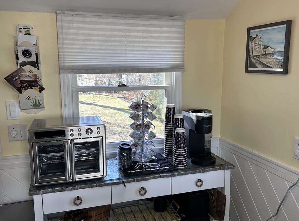 Kitchen showing coffee bar and toaster oven. “Galley”