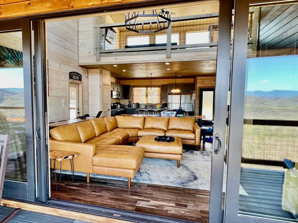 On a nice day, open the massive sliding glass doors for an 8 ft. opening...