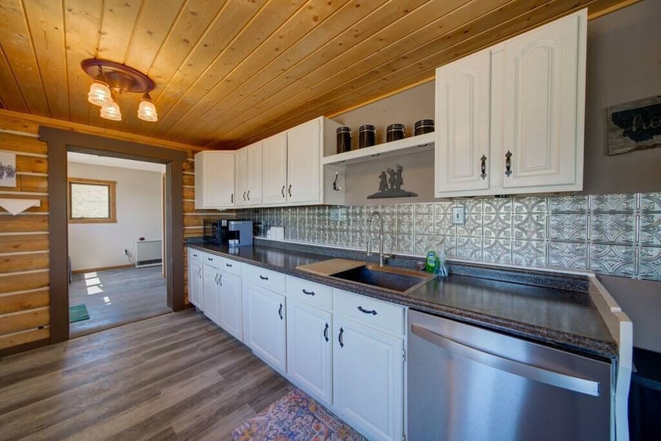 The large sink and dishwasher make clean up a breeze in this kitchen!