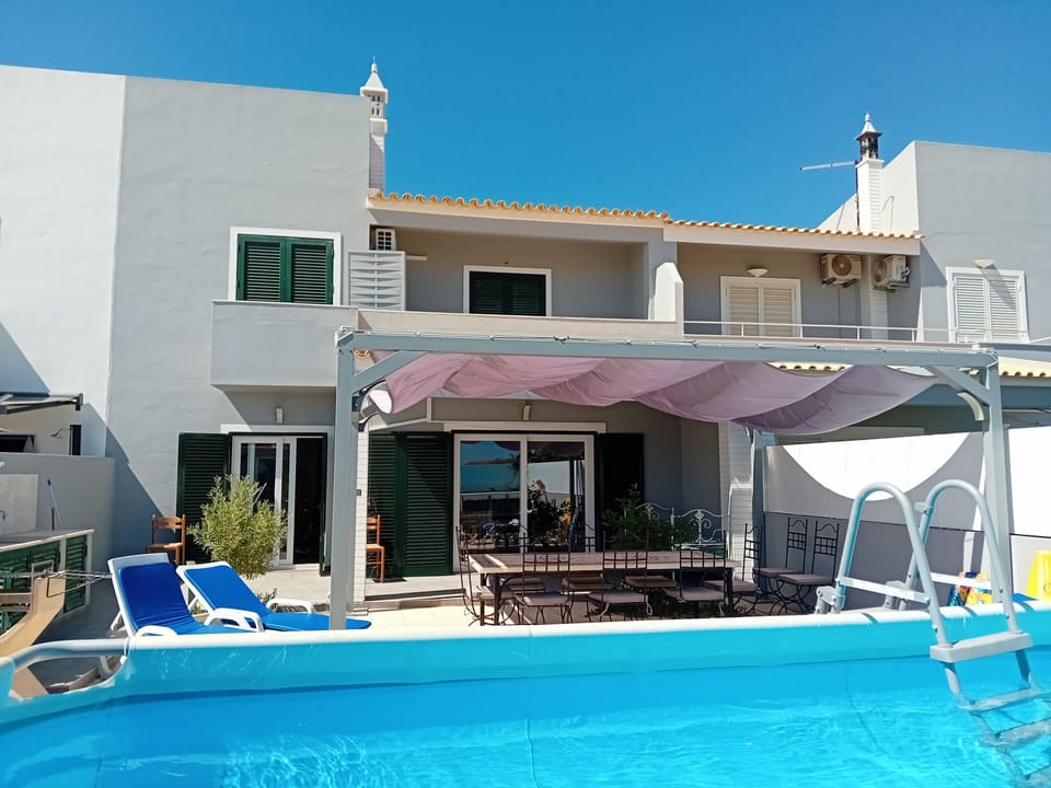 back house, backyard, pool, outdoor dining, bbq area