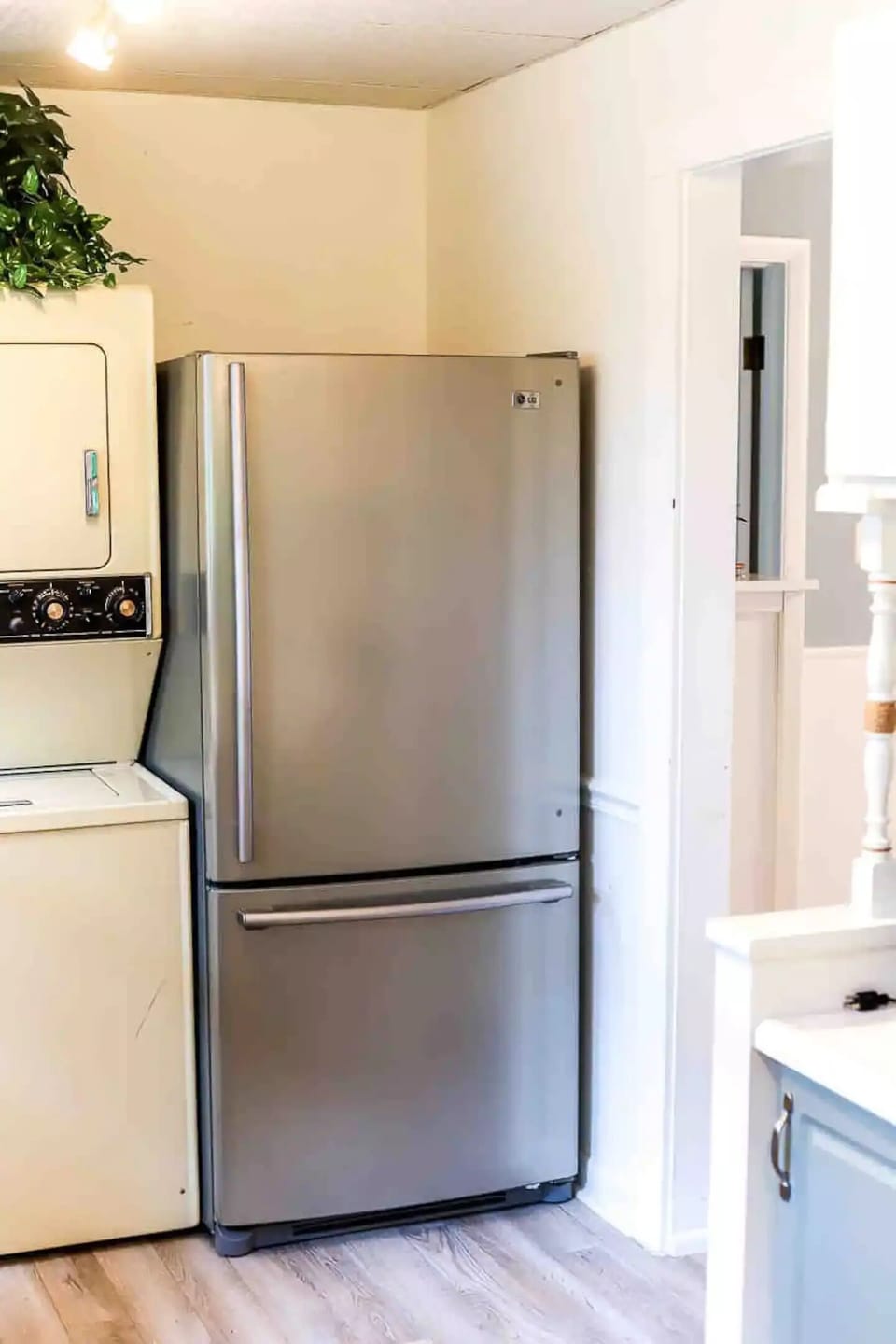 stainless steel fridge and washer/dryer