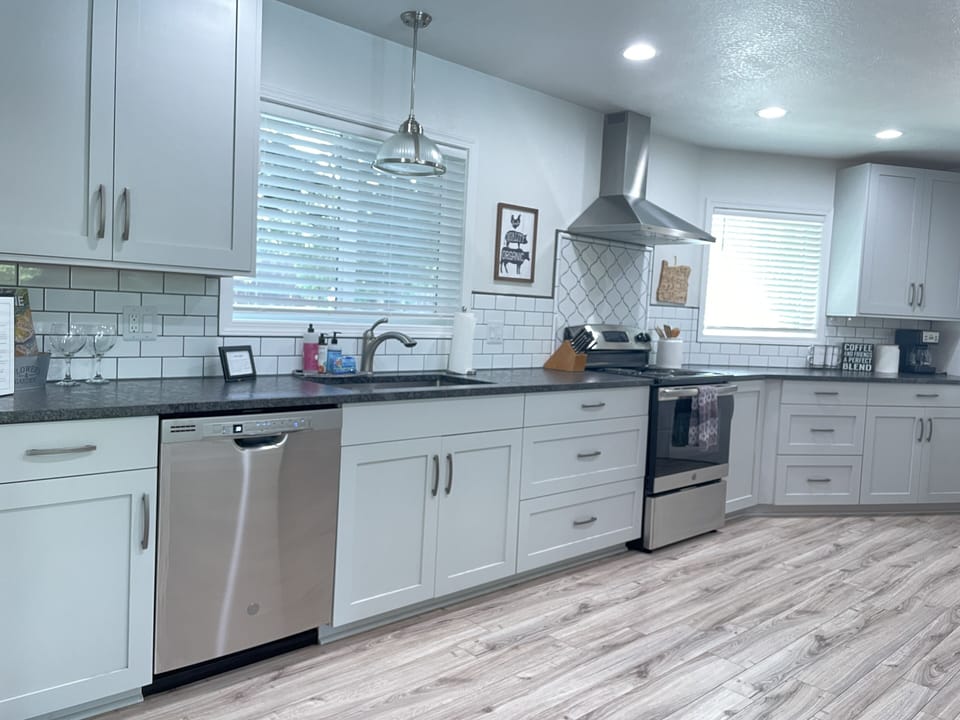 Large, modern kitchen is supplied with everything you need to make your own meal