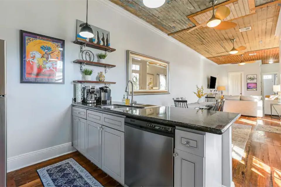 Kitchen has double sink and full-size dishwasher 