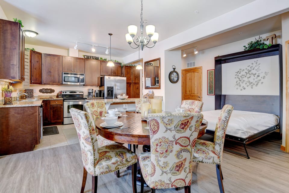Dining Area With Fold Out Murphy Bed Behind For Extra Sleeping Arrangements