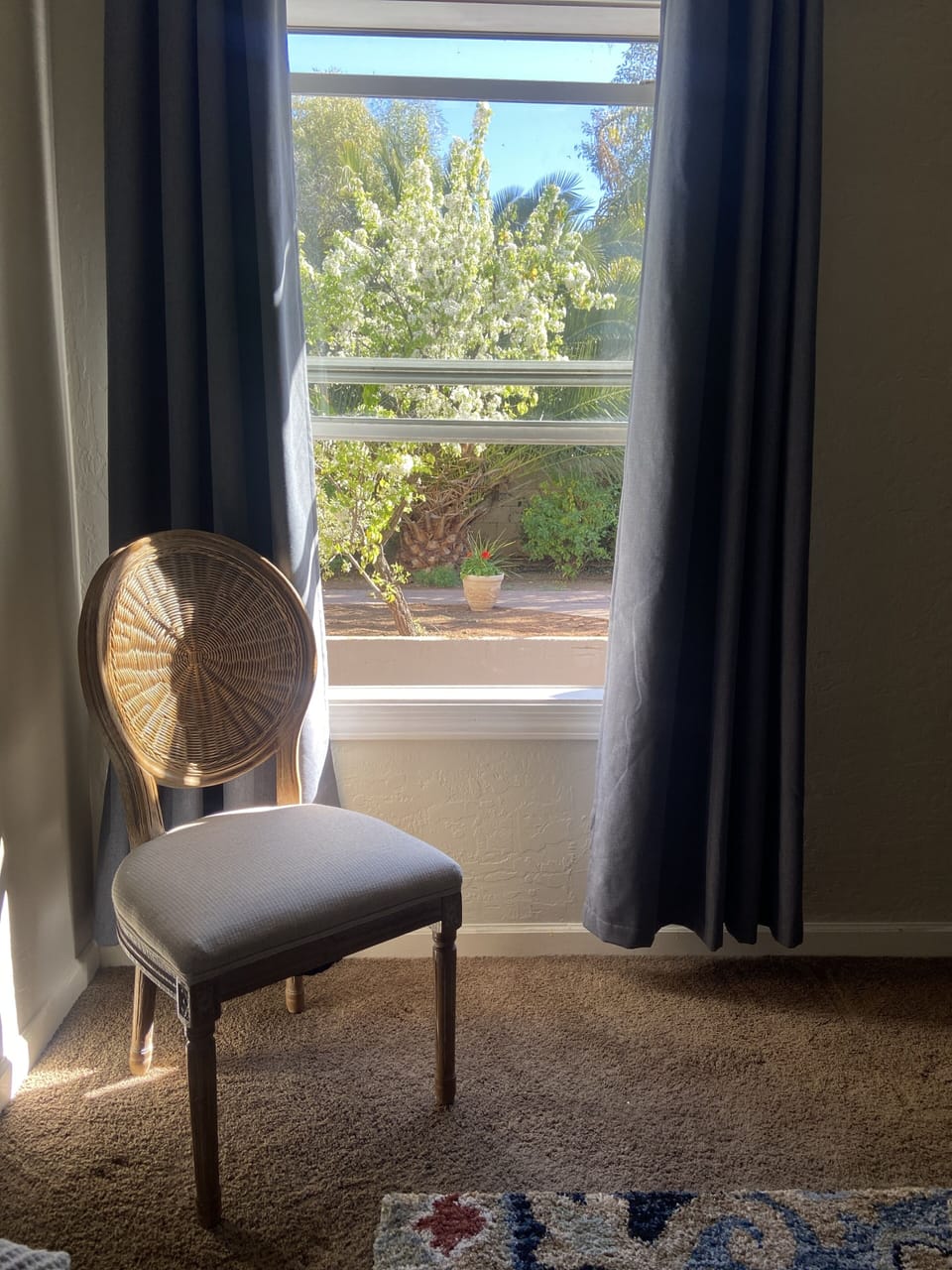 Window over atrium and looking out from bedroom #2