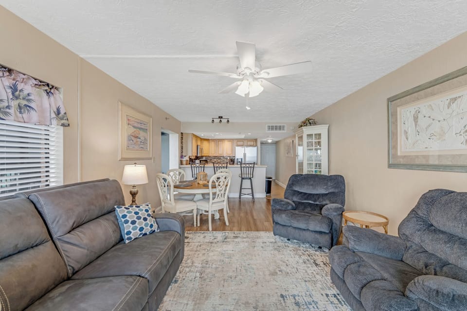 Positioned beside large windows offering ocean views during meals.