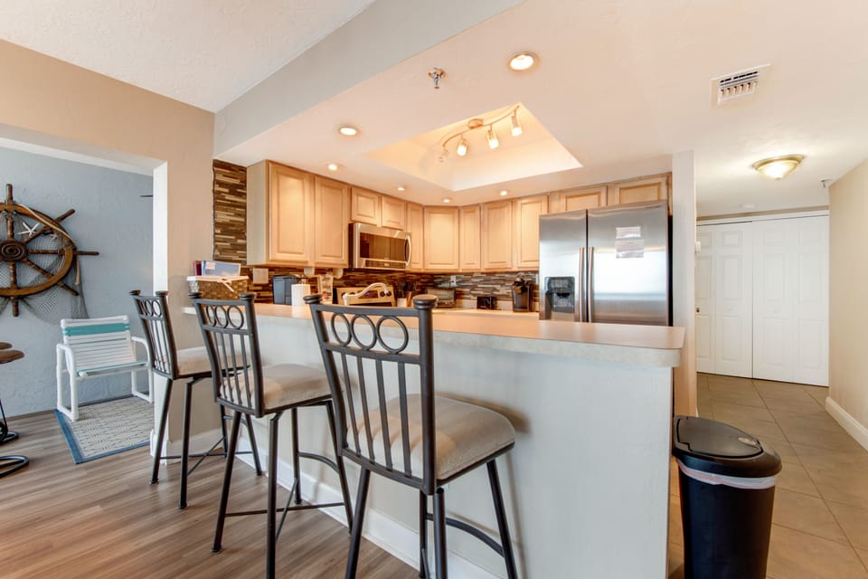 Open to the living and dining areas for an airy, connected feel.
